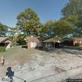 Suspicious person reported under porch at Oak Street