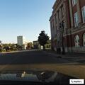 Officer checks man in wheelchair at civic center