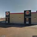 Jeep stuck after running over flower bed at Burger King