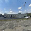 Suspect moves from truck to car at auto business
