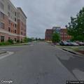 Officer checks tan SUV near hotel on Hamilton Drive