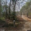 Woods fire endangering structures in Sumrall