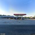 Vehicle sideswiped at gas station, driver left scene