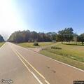 Tree partially blocking roadway near McComb Halls