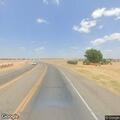 Pickup driving backward on Highway 84