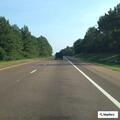 Car with flat tire on I-55 near Bogue Chitto