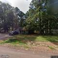 Neighbor yelling and throwing items over fence
