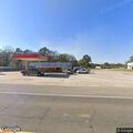Officer stops black Ford Expedition near grocery