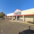 Suspicious vehicle behind Tractor Supply lot