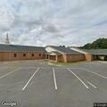 Woman with knife reported at church cemetery