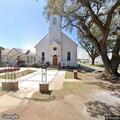 Bus blocking roadway near St. Augustine Church
