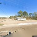 Male reported lying near road; no contact found