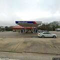 SUV hits barrier in Chevron parking lot