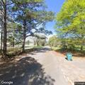 Tree blocking roadway on County Road (number withheld) near curve