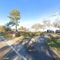 Motorcycle crash with injured person at intersection