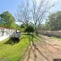 Trailer fire rekindles on Pittman Road