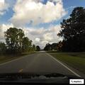 Person lying near road on South Coastal Highway