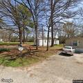 Disturbance with weapons at trailer park lot