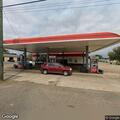 Officers investigate brown pickup at gas station