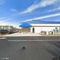 Traffic stop of blue Toyota at credit union lot
