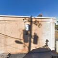 Truck hits pole in drive-through parking lot