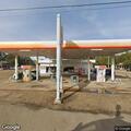 Car hit by loose tire at Mize gas station