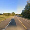 Traffic hazard at raised railroad tracks in Mize