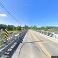 Bicyclist falls on bridge; ambulance requested
