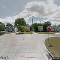 Man sitting on bench in middle of intersection, Monroe MI | CrimeRadar