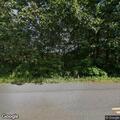 Tree leaning on power lines blocks road in Avon