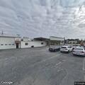 Extinguished fire reported at auto dealership