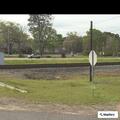 Bank teller requests escort due to man on bench