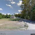 Report of person shining light at house and cans