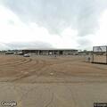 Young male with breathing trouble and chest pain at industrial site