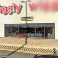 Driver spinning donuts in grocery store parking lot