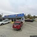 Sedan and dump truck crash at Eden gas station