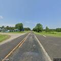 Two-vehicle crash with rollover and injuries in Flint