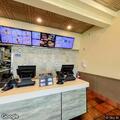 Man throws rock at Taco Bell building