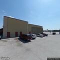 Male patient with chest pain in red car at store