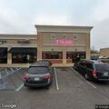 Officer checks person outside T-Mobile on Atlanta Hwy