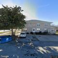 Person injured after fall at apartment with red door