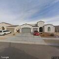 Man and woman try to open garage with unknown device