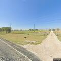 Quarter acre grass fire along FM 2331 roadside