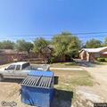 Resident reports unknown person living in garage