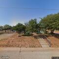 Person walking in middle of West Alabama Street