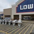 Employee vehicle hit by cart in store parking lot