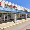 Officer checks security at beauty supply store