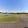 Traffic stop with white Nissan Altima at park