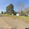 Person yelling in driveway at Country Villa Lane