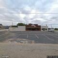 Burglary alarm with open back door at business